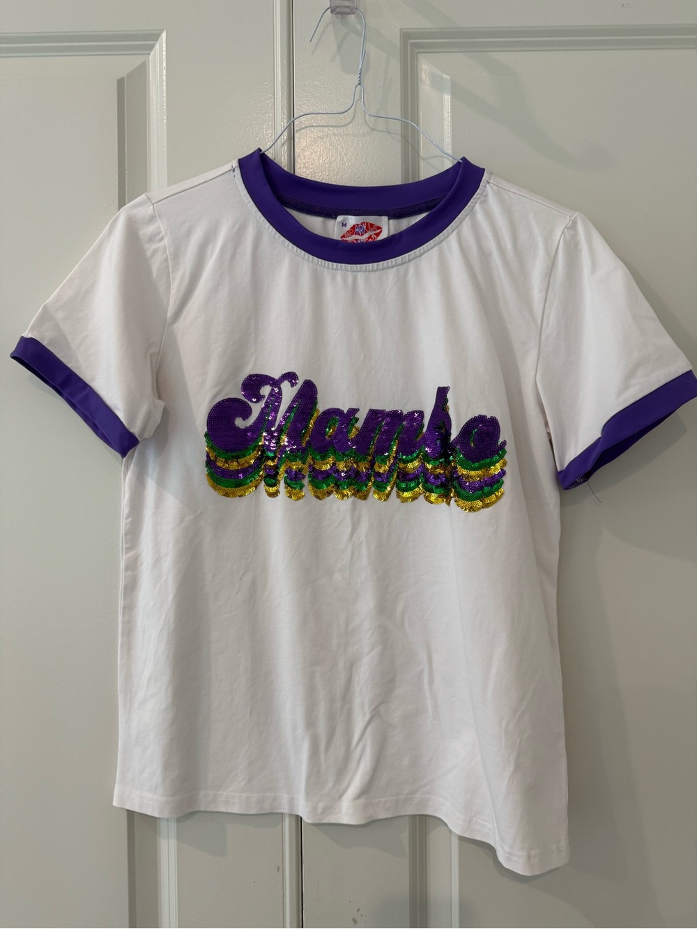 White Short-Sleeve Mardi Gras Mambo Tee with Purple Trim and Sequin Script